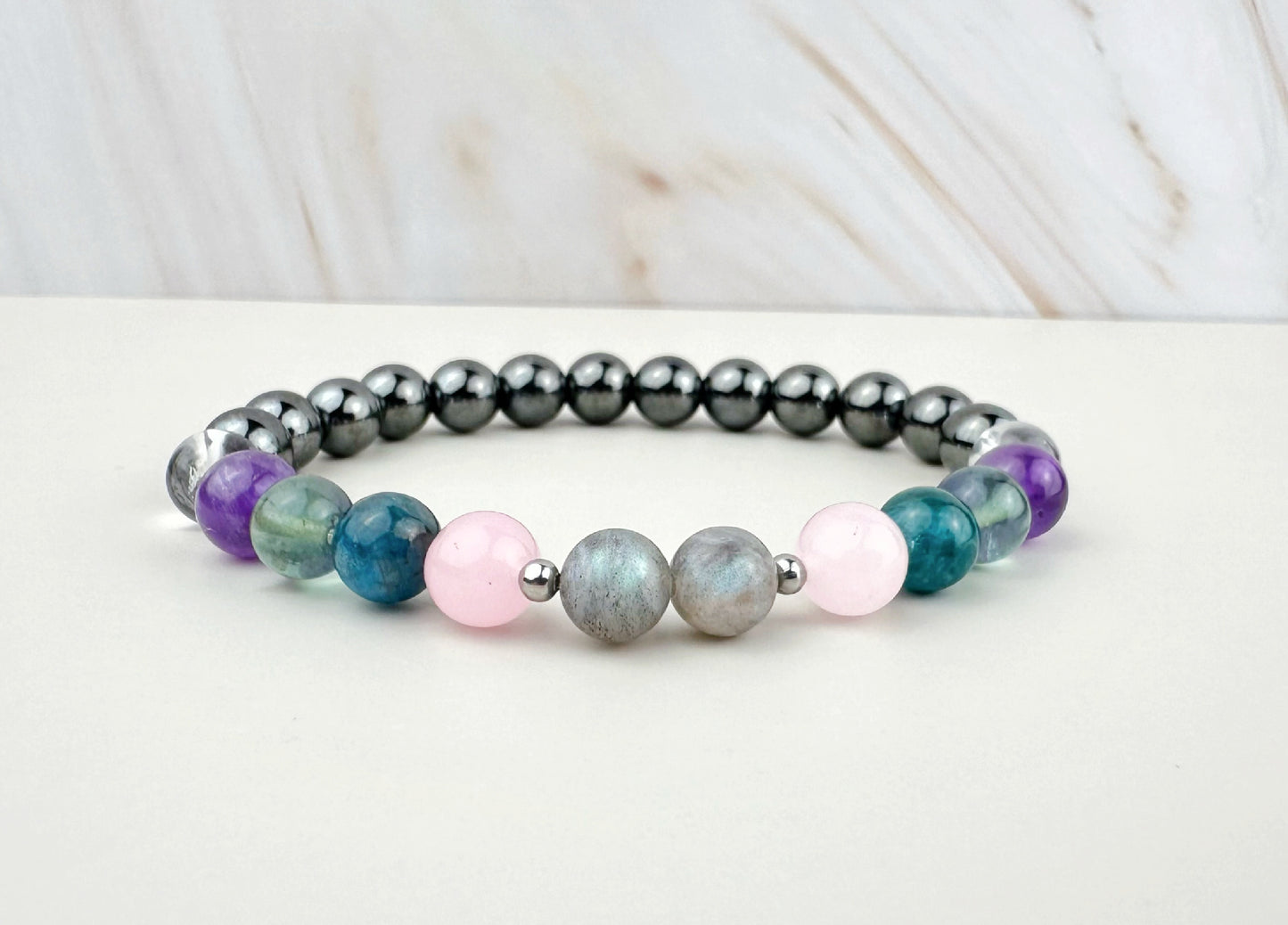 Multicolored beaded bracelet on a white background