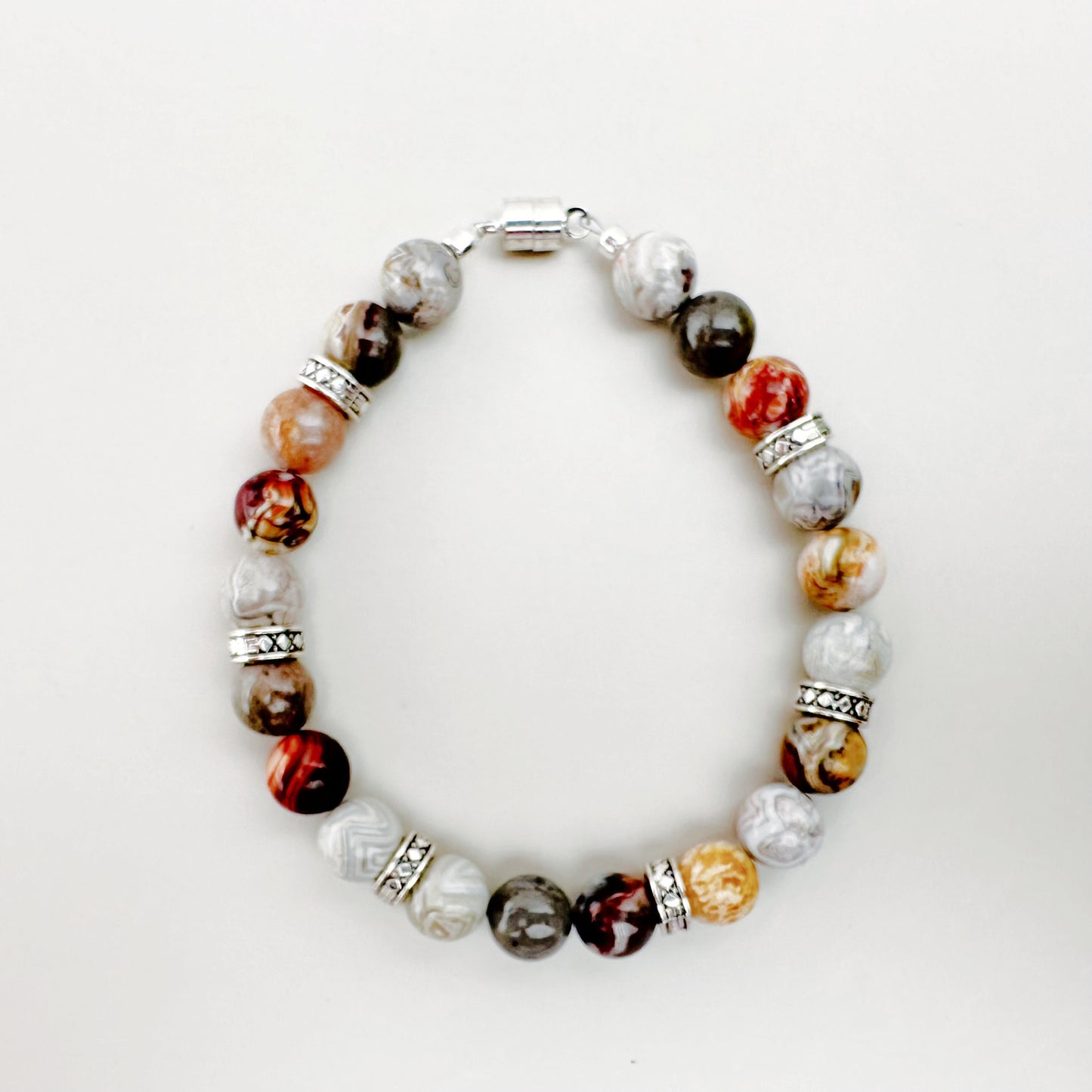 Beaded bracelet with multicolored beads on a white background