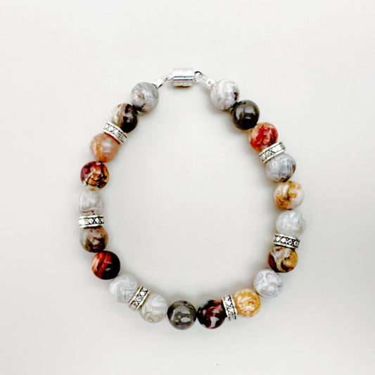 Beaded bracelet with multicolored beads on a white background